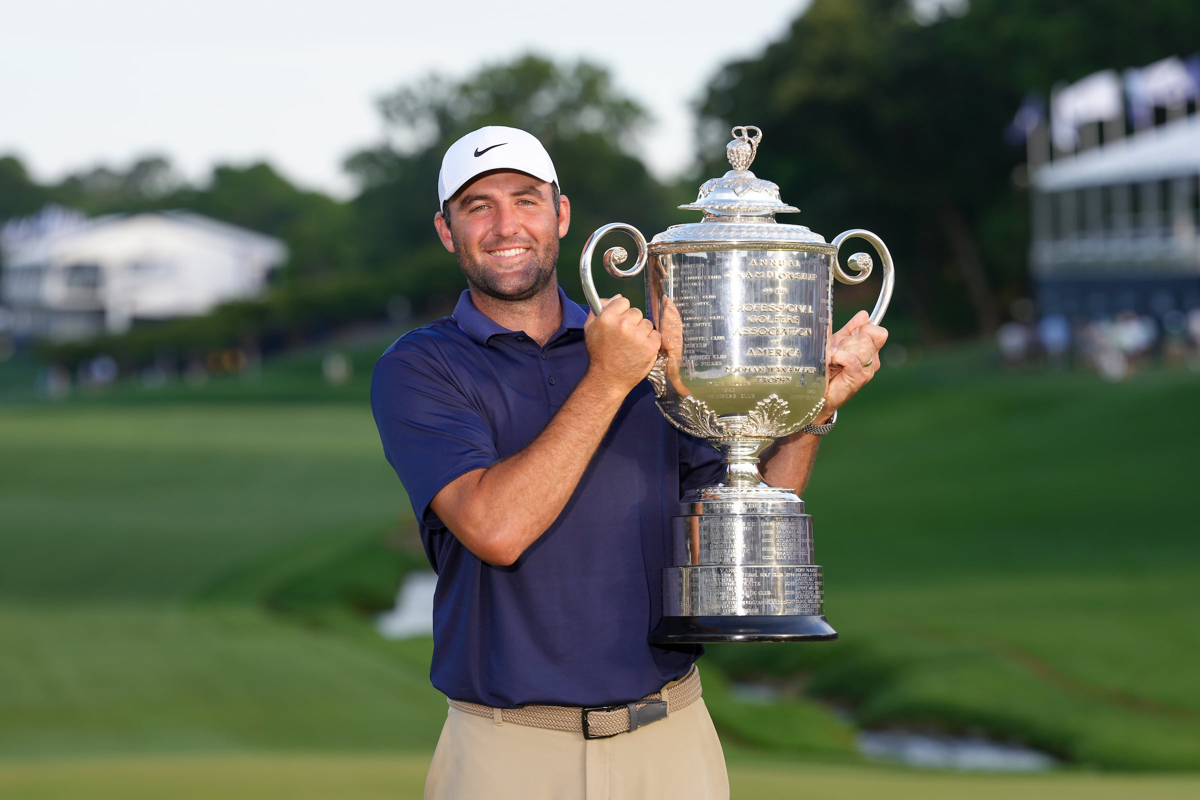 Scottie Scheffler poses with the Wanamaker trophy after winning the PGA Championship at Quail Hollow Club.